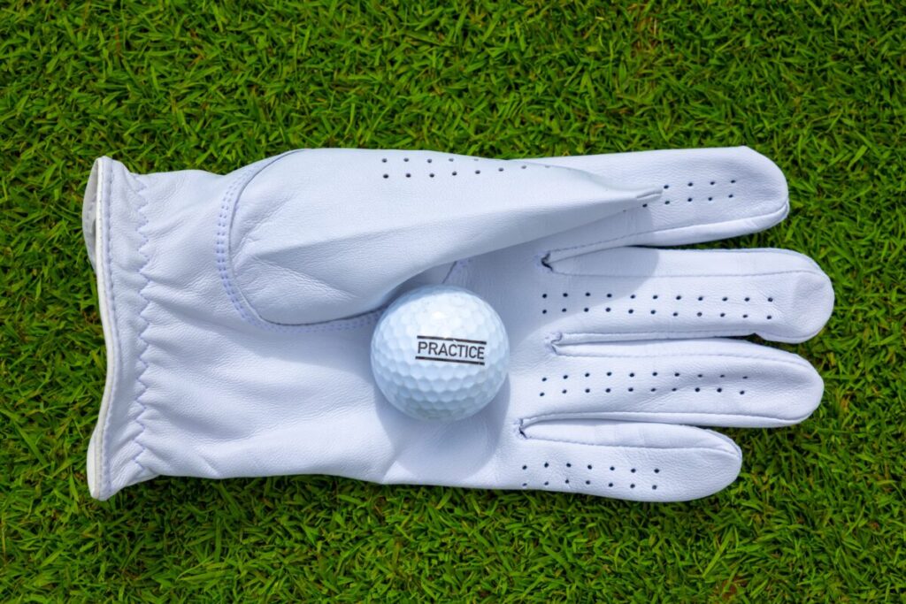 The Ultimate Guide on How to Clean and Care for Golf Gloves 4 Rinsing golf glove under cold water to remove soap