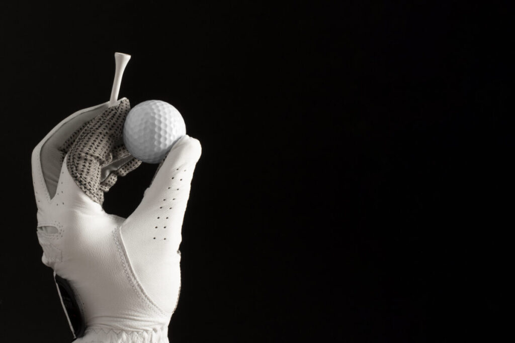 The Ultimate Guide on How to Clean and Care for Golf Gloves 8 Golfer wearing a clean golf glove